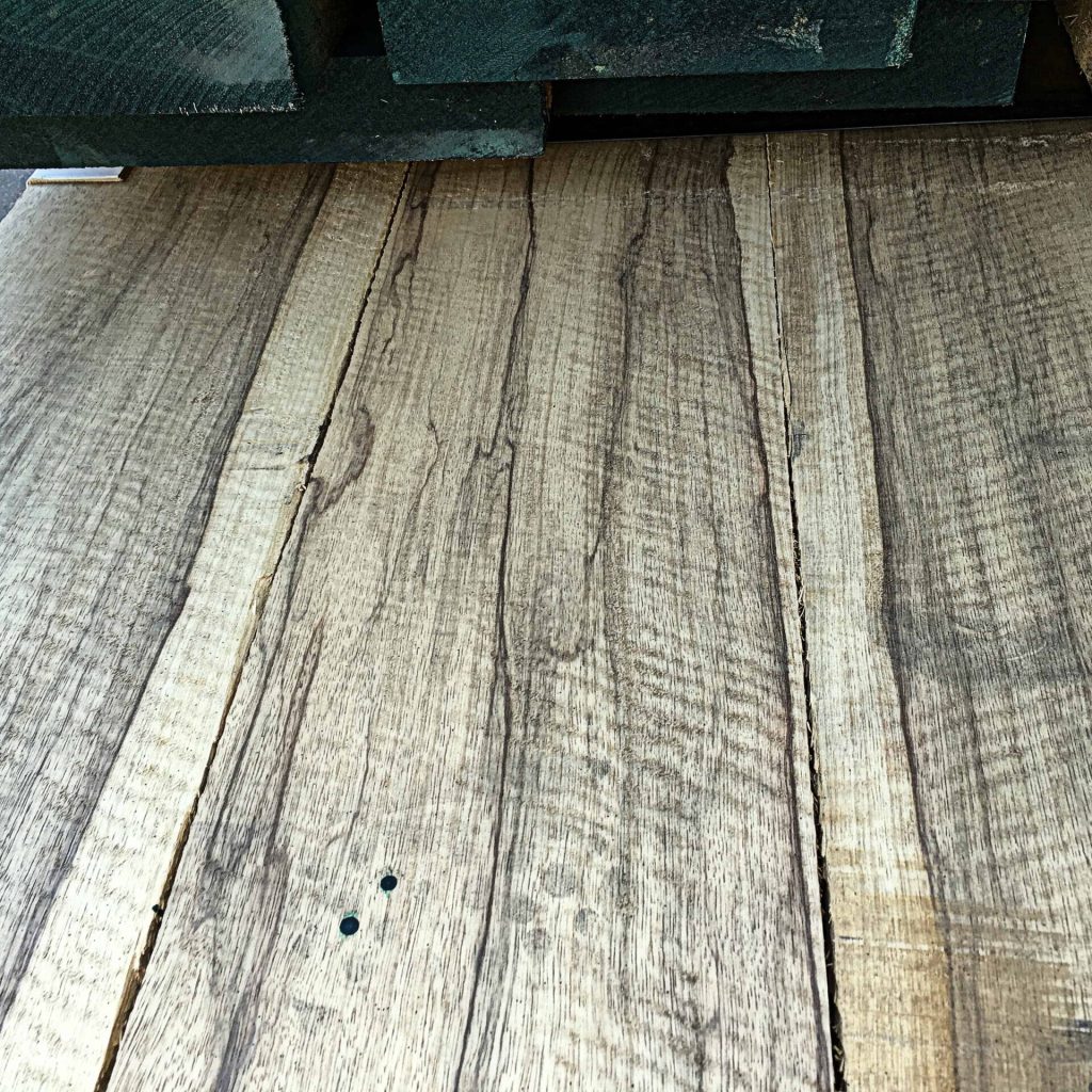 Flame figured black limba Commercial Forest Products